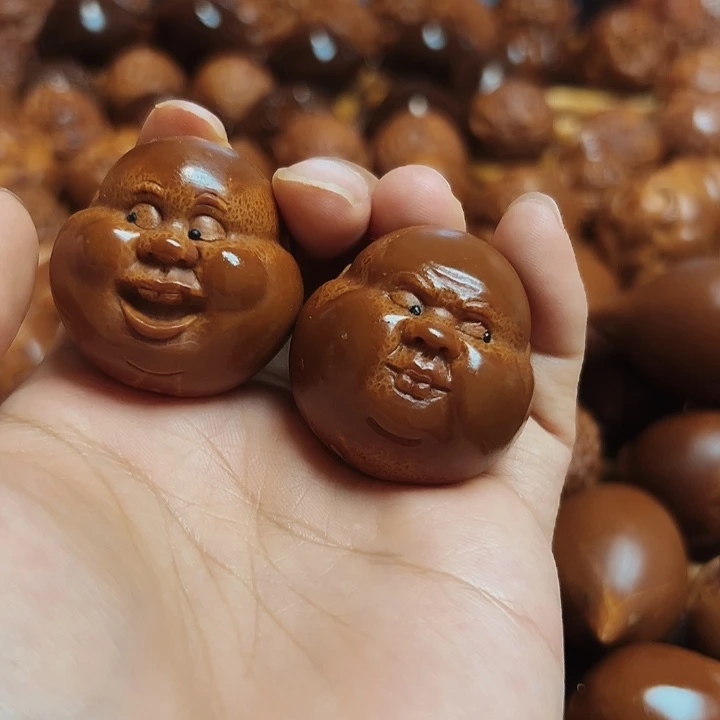 M****橄榄核把件阿呆一对