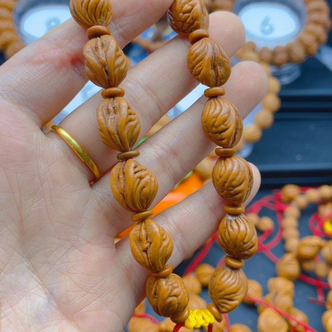 龚***哥桃核吊坠24权权权权