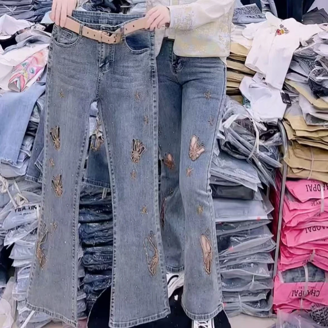 重工镂空刺绣微喇裤欧货烫钻大码梨型身材牛仔裤女高腰显瘦长裤潮