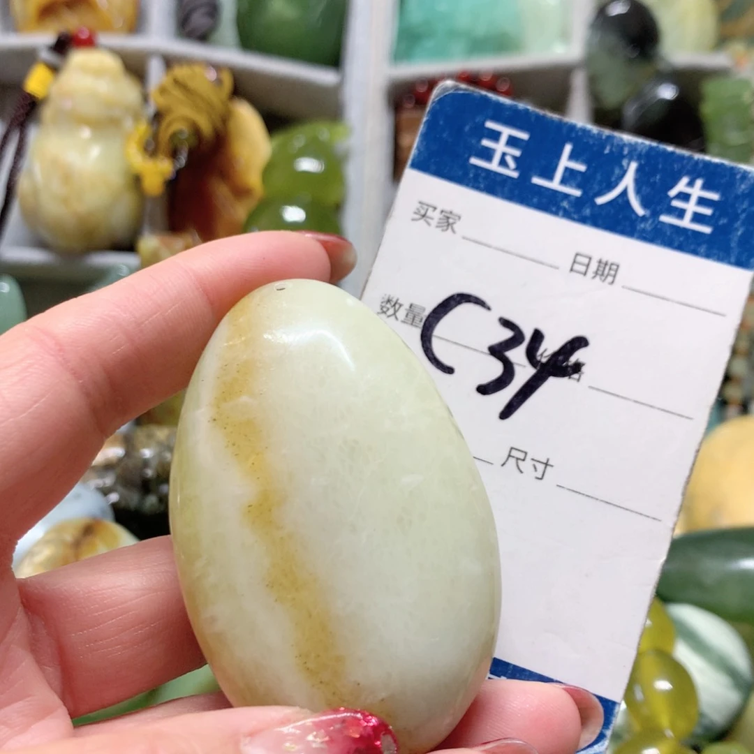 蛇纹石玉手把件未镶嵌盛**年