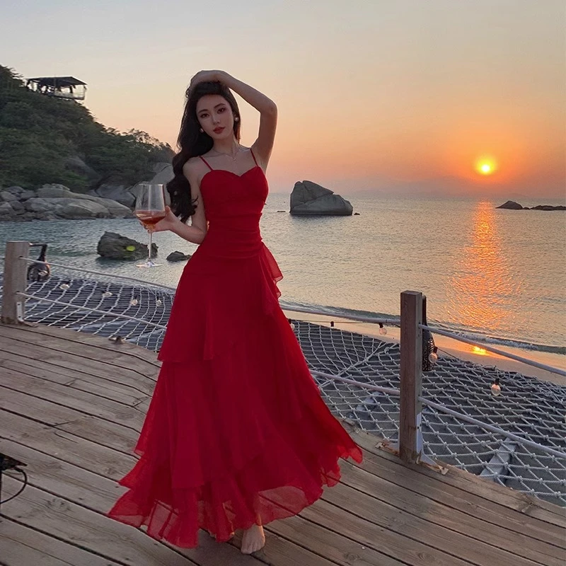 法式荷叶边大裙摆红色雪纺飘逸沙滩连衣裙海边度假收腰吊带长裙夏