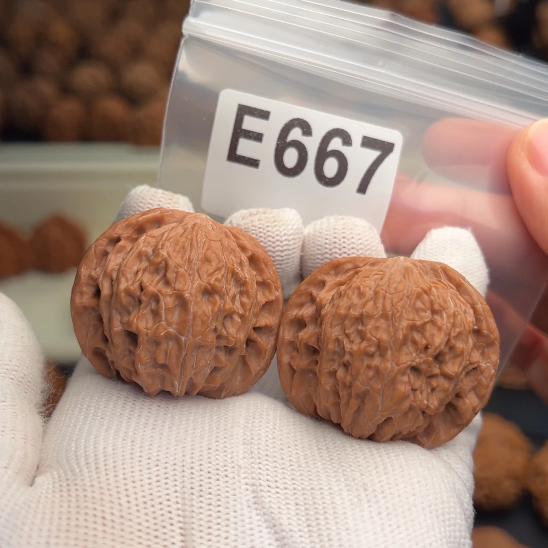 圣***罗文玩核桃吊坠E667石子磨41