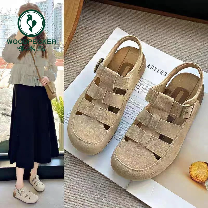 啄木鸟罗马凉鞋女2025夏新款镂空勃肯鞋软底沙滩鞋编织平底猪笼鞋
