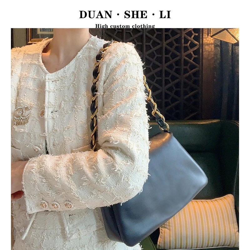 2025春夏小香新款宽链条腋下大眼睛包羊皮链条斜跨包