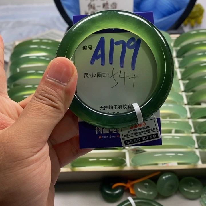 紫***壳未镶嵌蛇纹石玉手镯