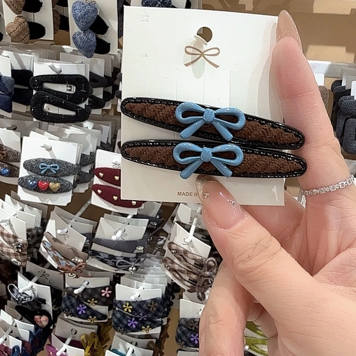 蓝色蝴蝶结棕色一字夹