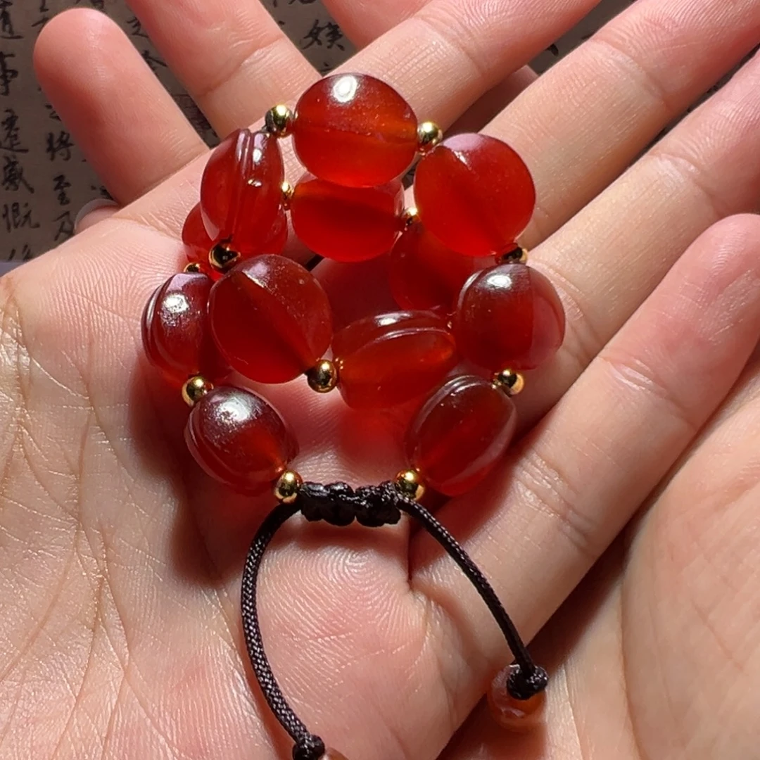 乐***藏玛瑙/玉髓未镶嵌玛瑙。   珠子