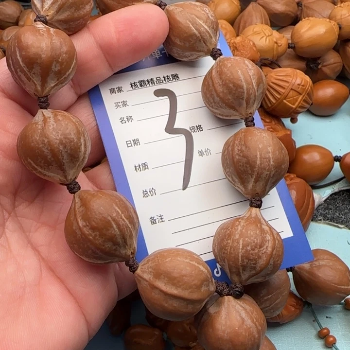 橄榄核手串梦**输橄榄核雕工艺手串