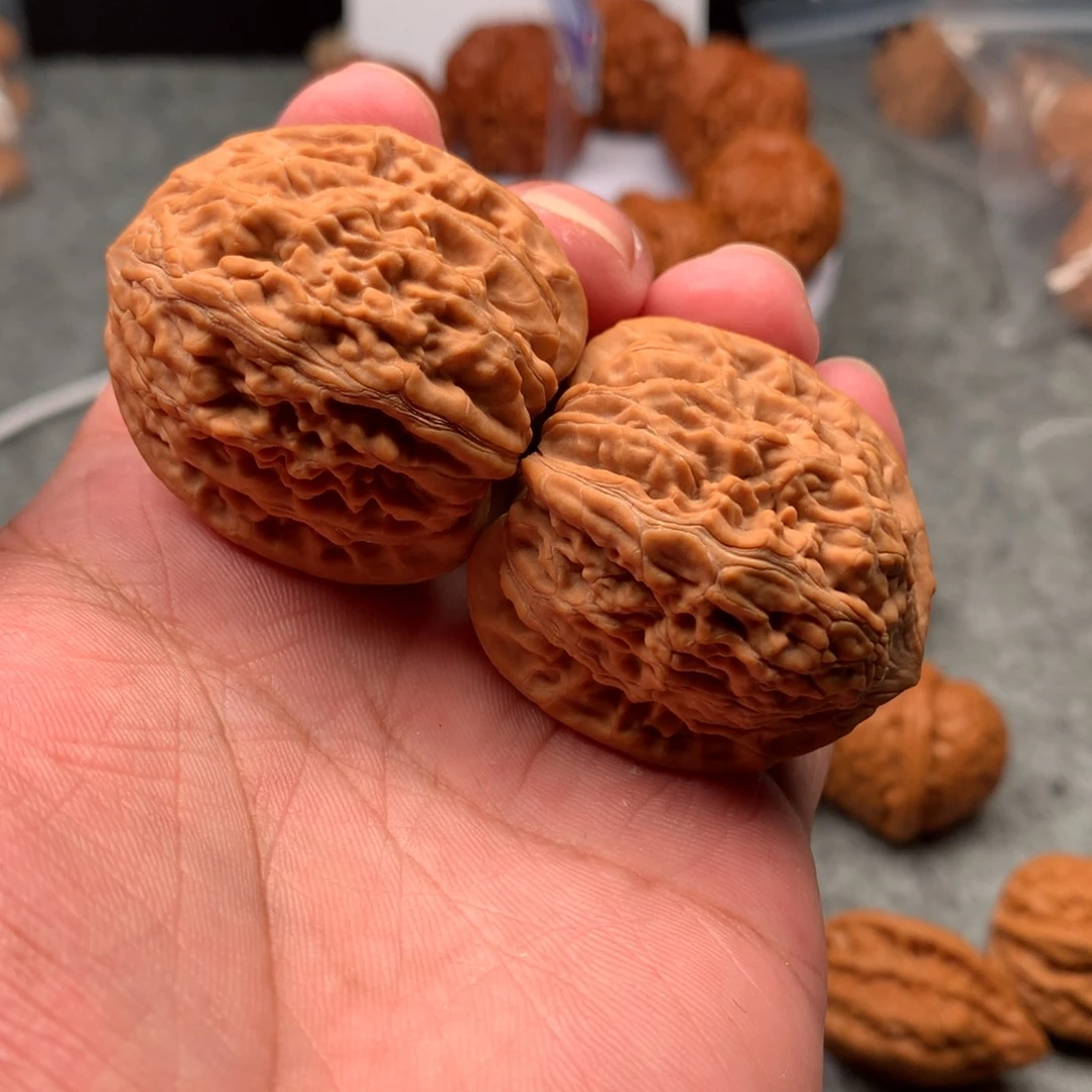 Q***q吊坠桃核平谷火麒麟