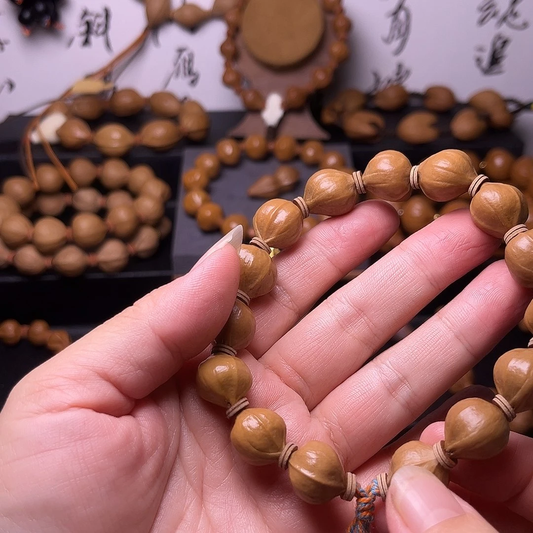 橄榄核手串梅林蜜桃臀14.15微微微瑕疵