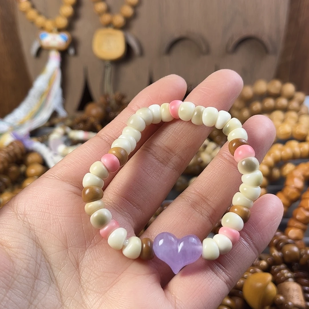 吊坠菩提根/象牙果彩色龙脊大肠手串