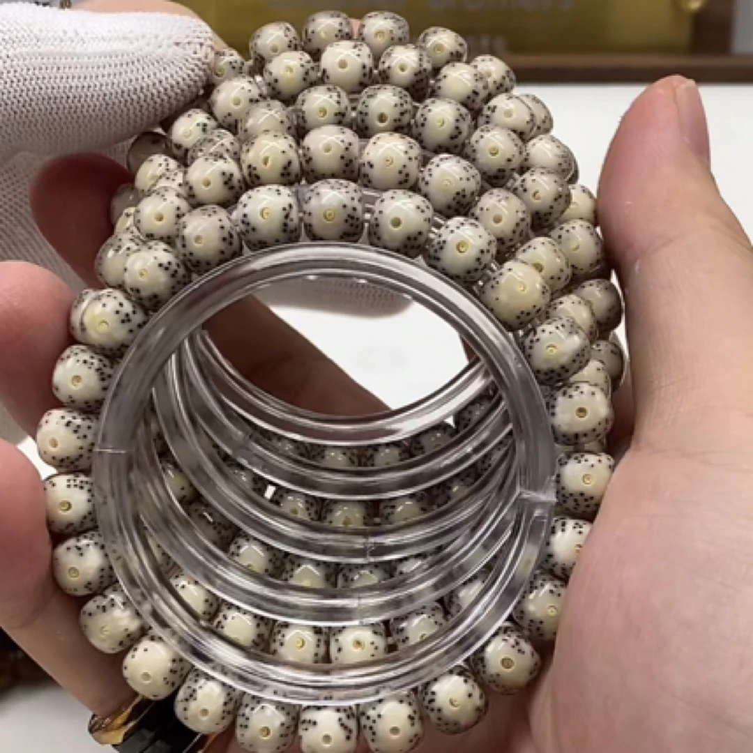 159 石玉料牛眼星月菩提手串 9x8mm