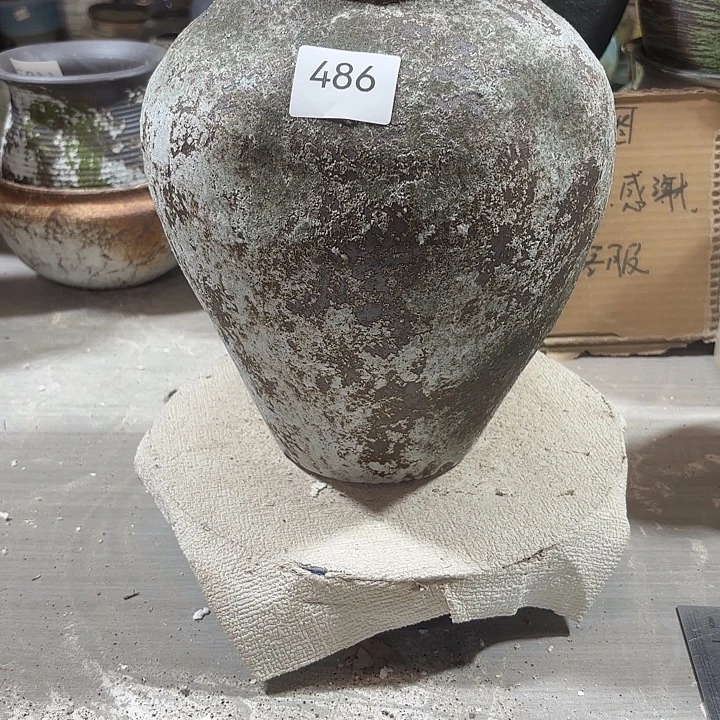 摆件陶486，瑕疵处理有孔，高26，口8，