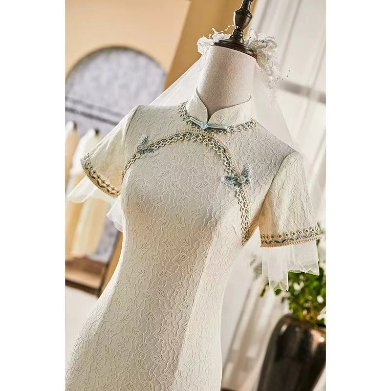 0163 米色 美玲襟 2边 立体 蝴蝶扣旗袍