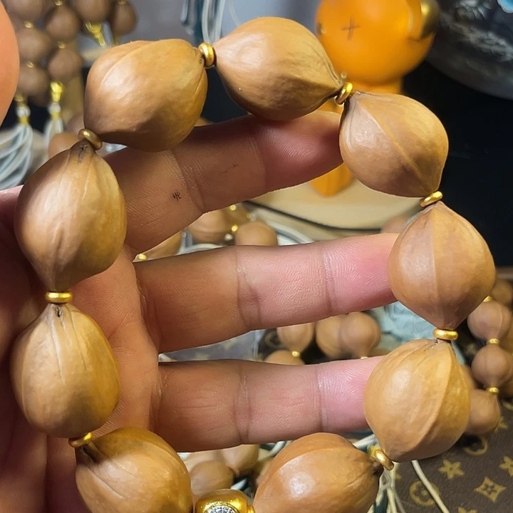 手串橄榄核梅林黄胖