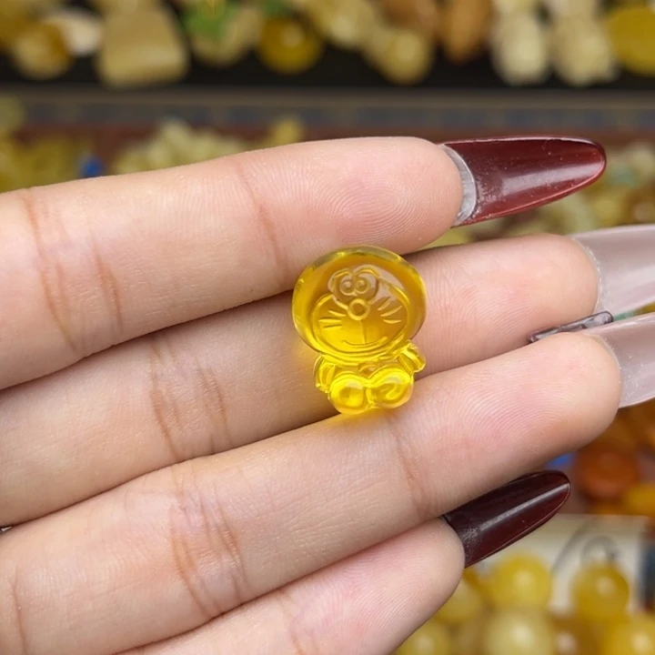 蜜蜡未镶嵌珠宝奇石金珀叮当猫设计款一个