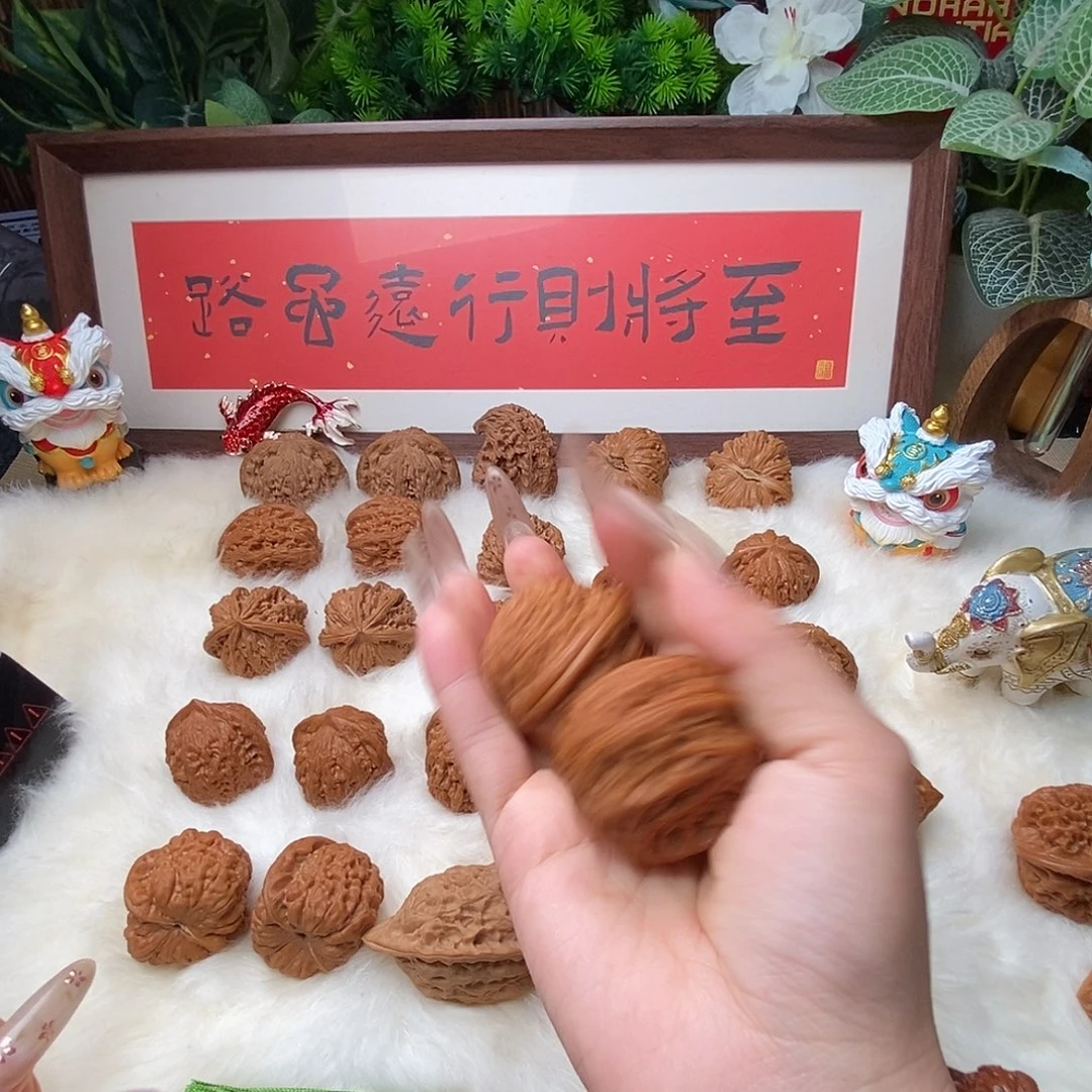 乔****把件文玩核桃串……