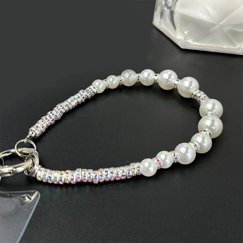 白色珍珠超闪钻石手链挂件轻奢时尚手腕链ins女款手机链条