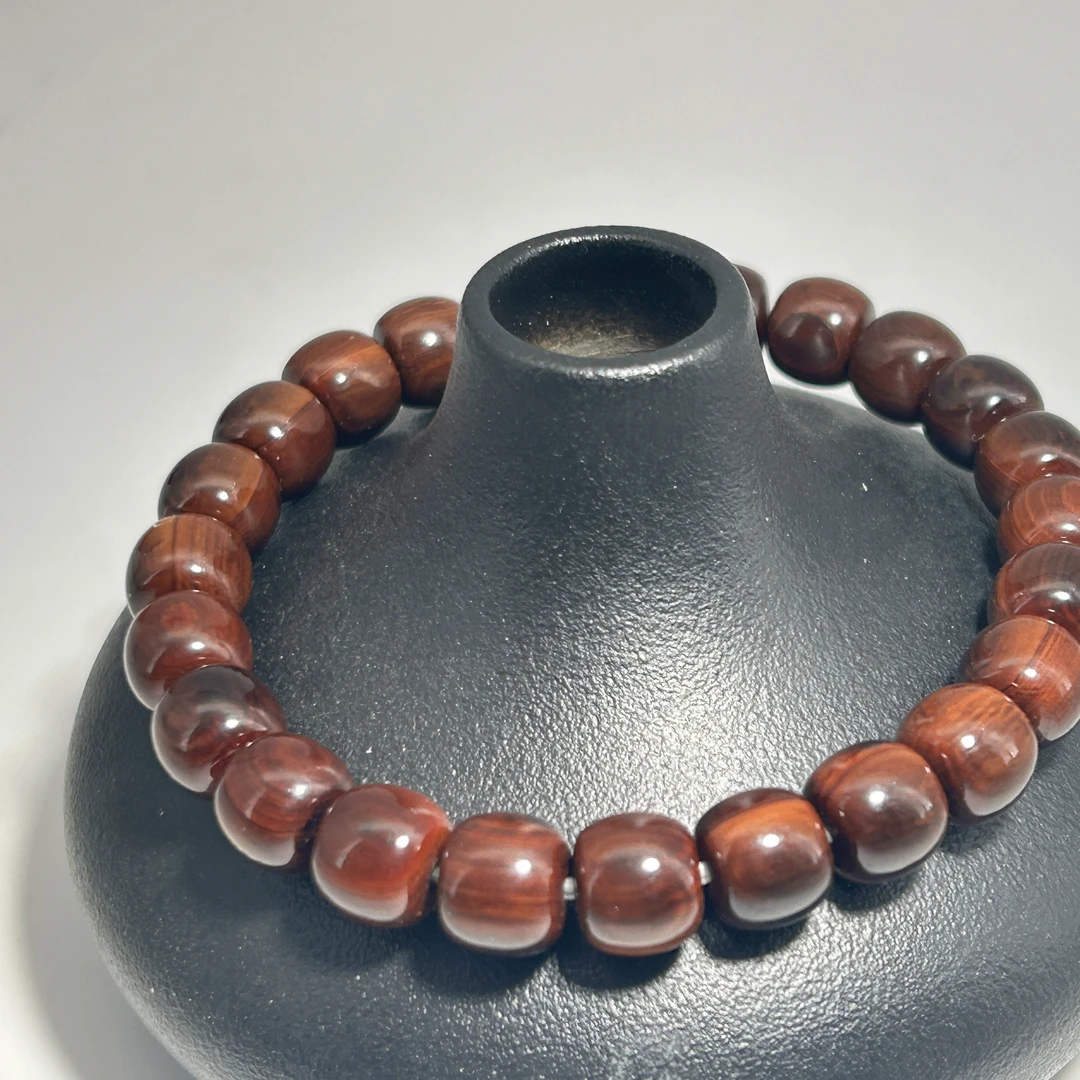 猛犸牙猪肝红老型单圈手串8*7mm假一罚四X1762