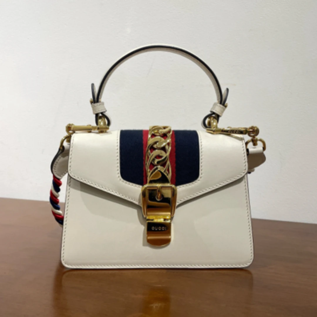 99新 GUCCI/古驰 白色塞尔维亚小号手提斜挎包