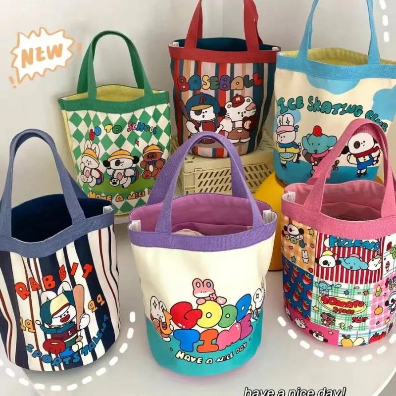 可爱插画小狗水桶型手提帆布包韩风少女心妈咪包便当袋上班小拎包