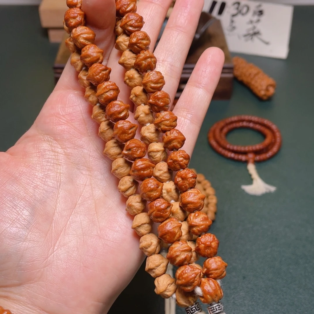 吊坠柏香籽/百香籽白牙横打手持