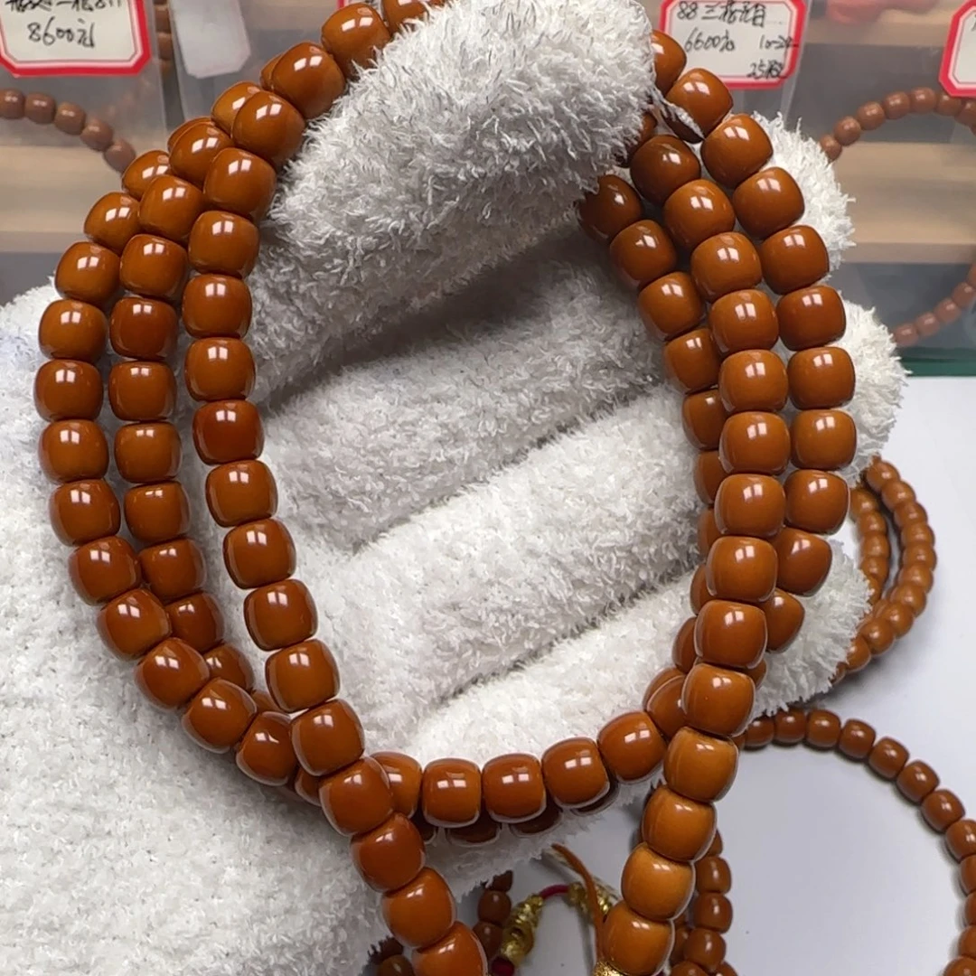 橄榄核吊坠老挝7.6mm三花面无白脖挂