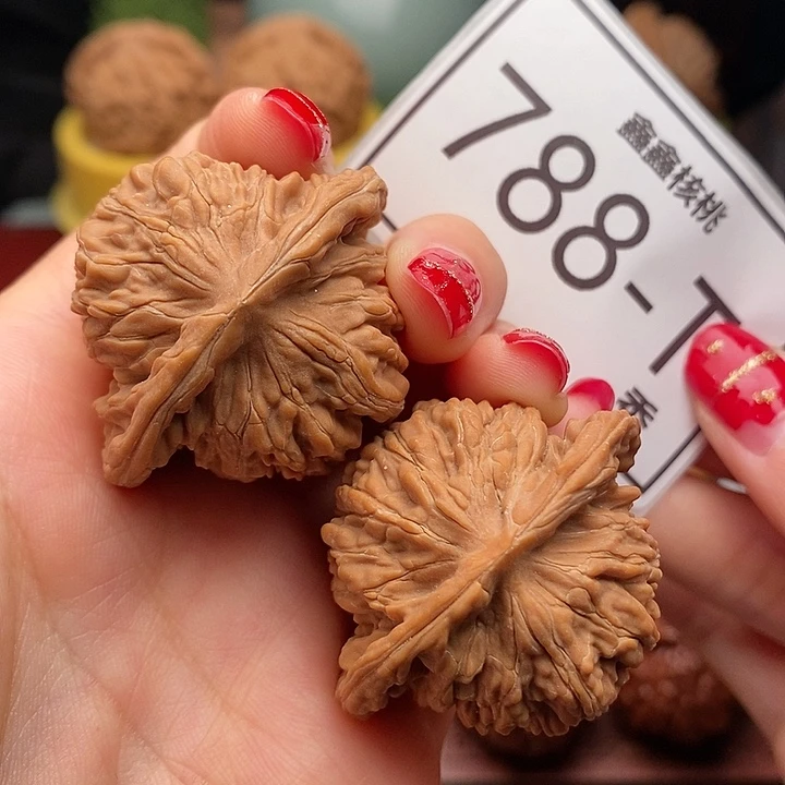 桃核把件汗高楼42……