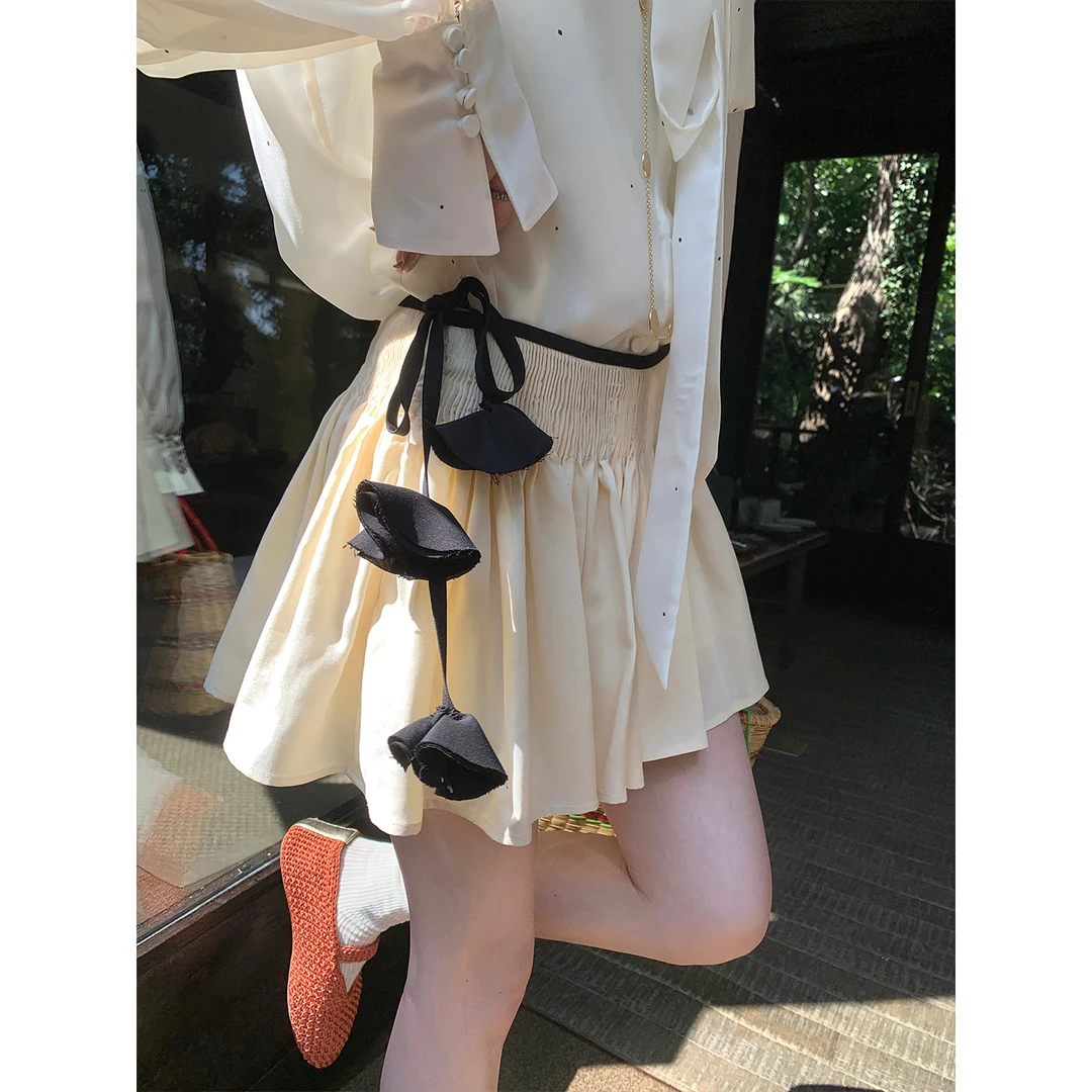 区区欧阳 天丝花朵飘带半身裙女夏季短款A字裙裙子高腰短裙百褶裙