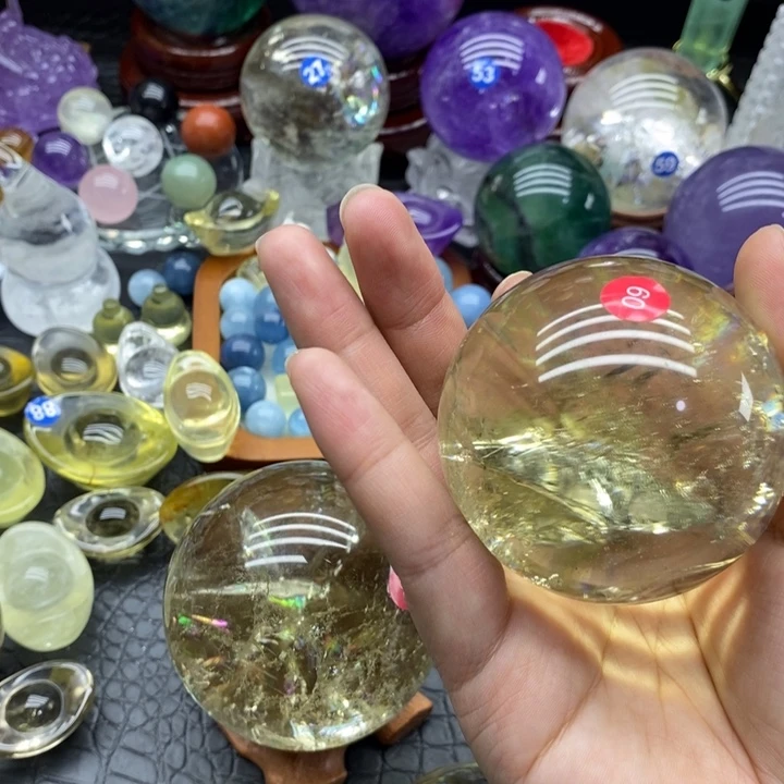 摄***9石材天然黄水晶球