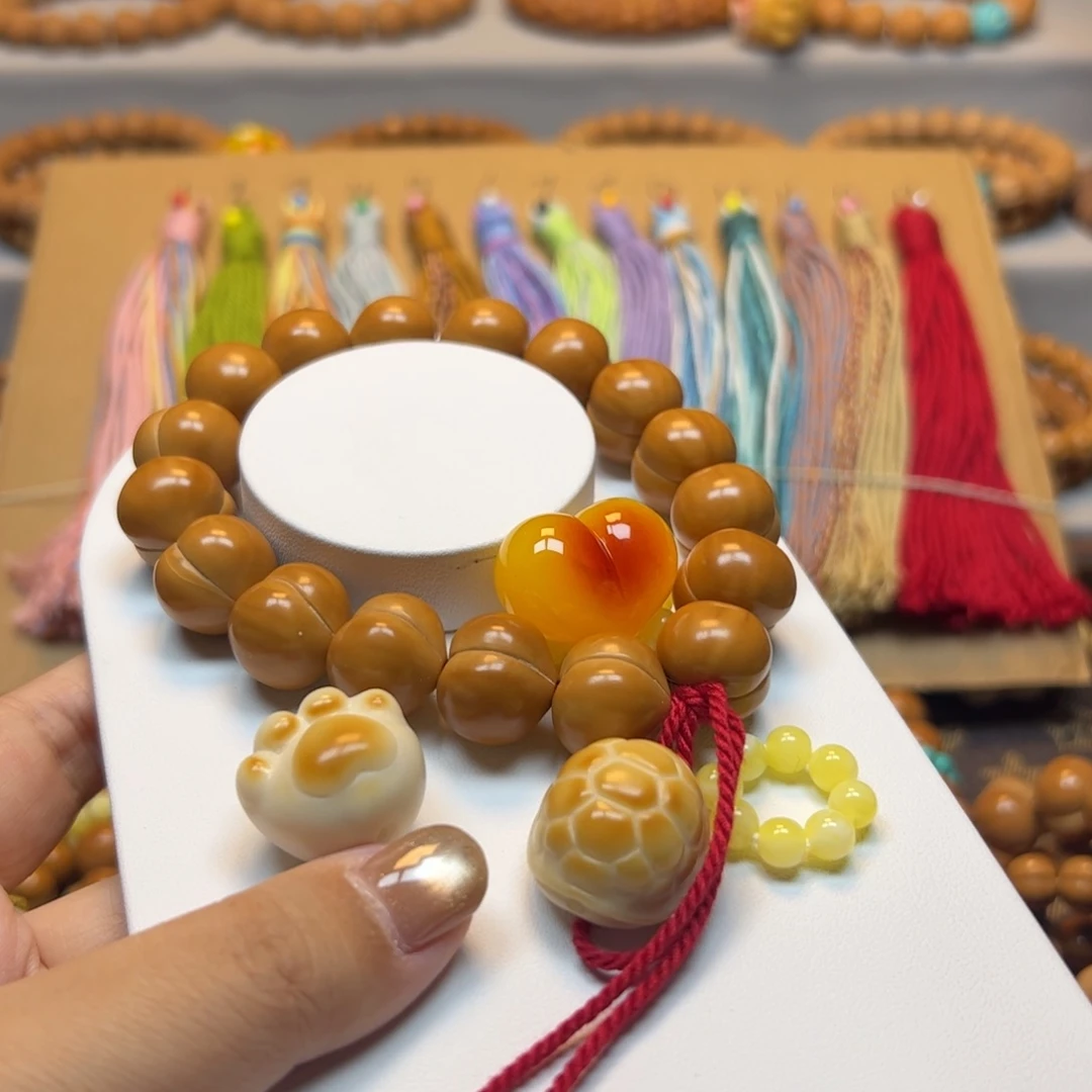 l***r猴头核桃手串16➕屁桃大满配