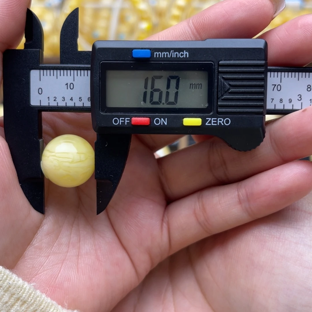 琥珀未镶嵌裸石蜜蜡圆珠微瑕笑