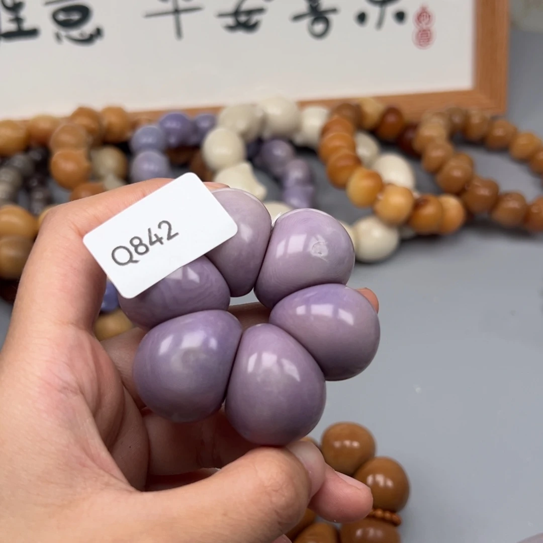 苬***沐菩提根/象牙果吊坠Q842蒜瓣24-26瑕疵一串