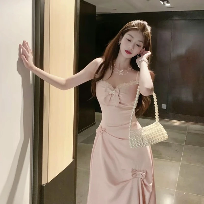 星语心愿法式粉色蝴蝶结吊带连衣裙女2025夏季度假生日礼服长裙潮