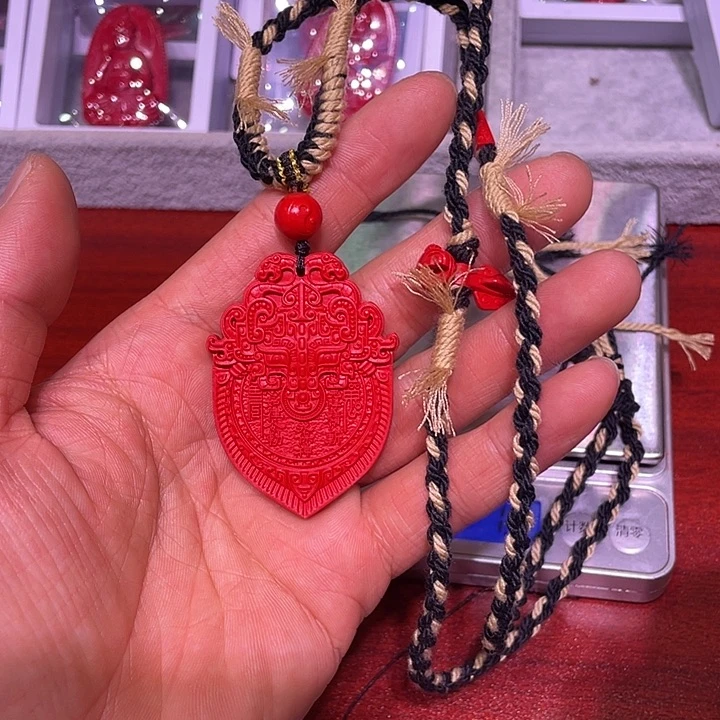 天然辰砂水飞砂红砂山花钱吊坠