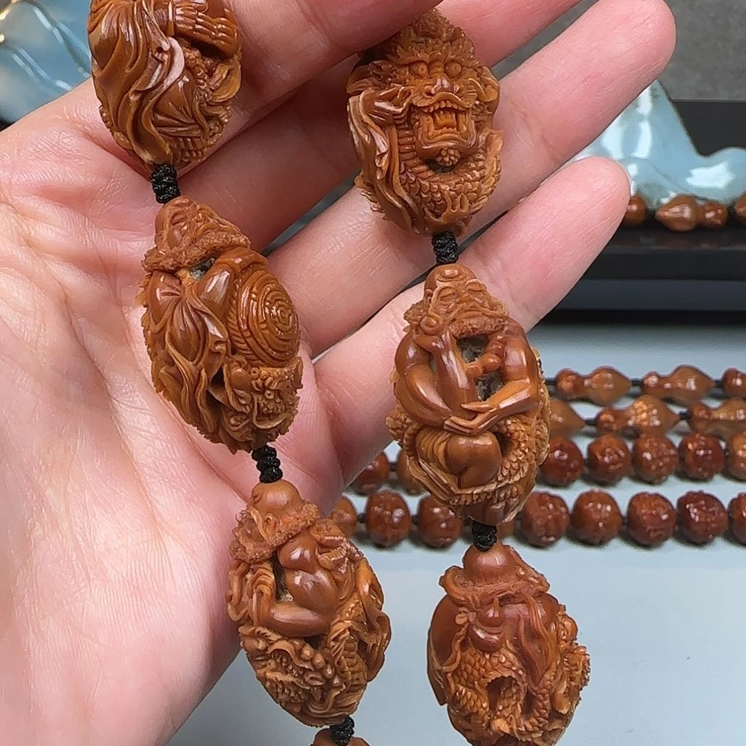 橄榄核吊坠御龙达摩