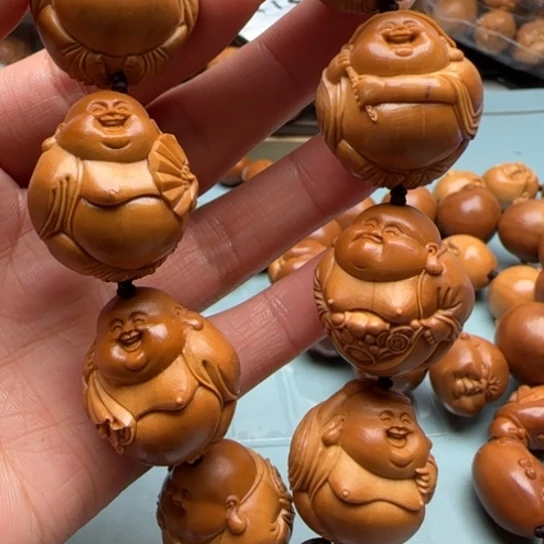 用***8桃核吊坠橄榄雕工艺品