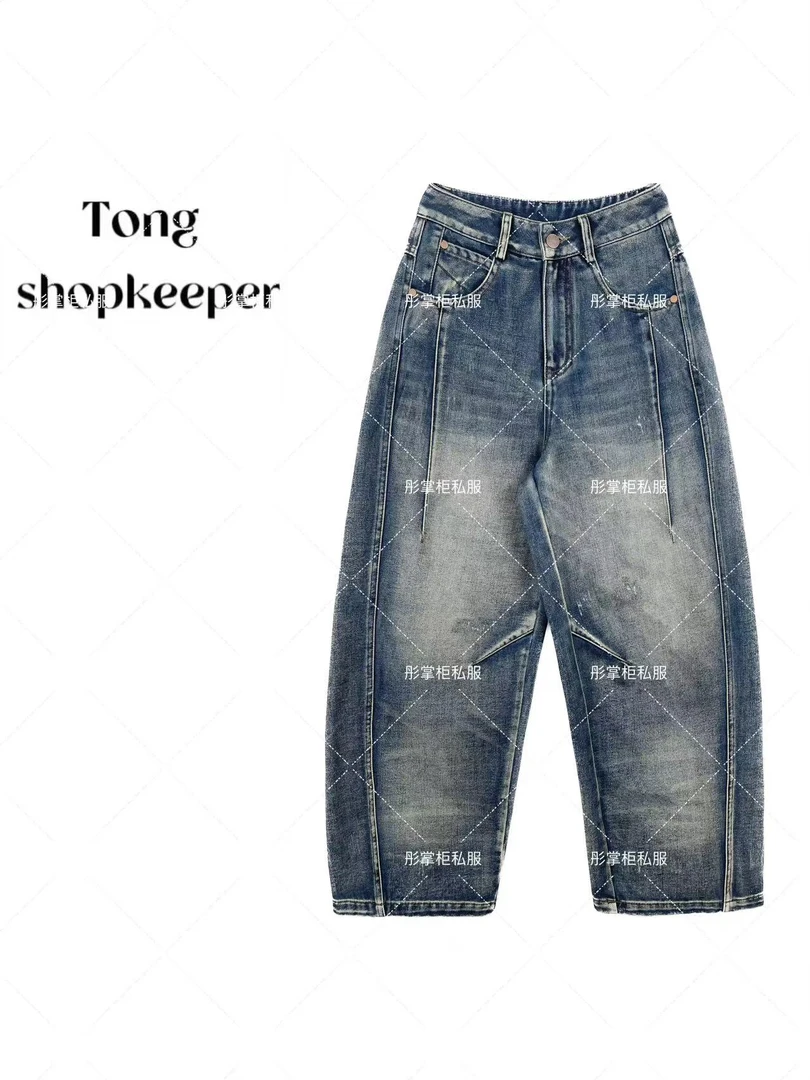 QJ/彤掌柜1681281 冬季25加厚水洗牛仔划痕做旧时尚牛仔裤