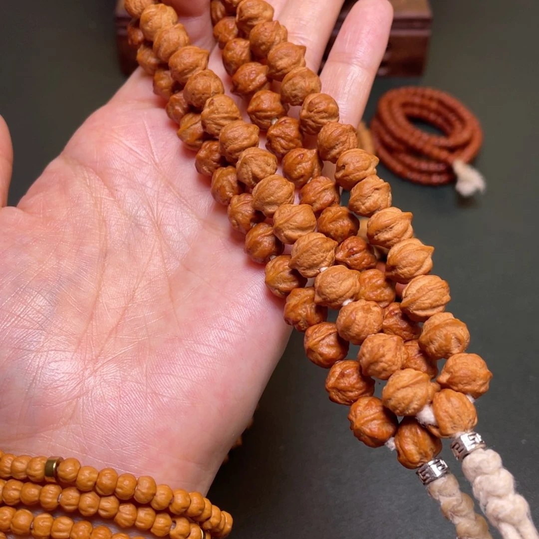 柏香籽/百香籽吊坠白牙横打手持