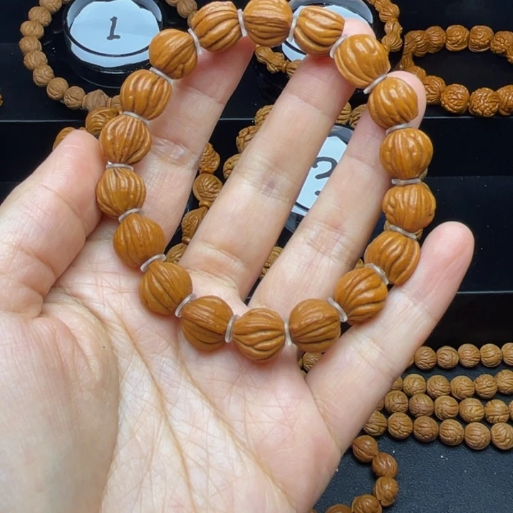 吊坠桃核佛手手串