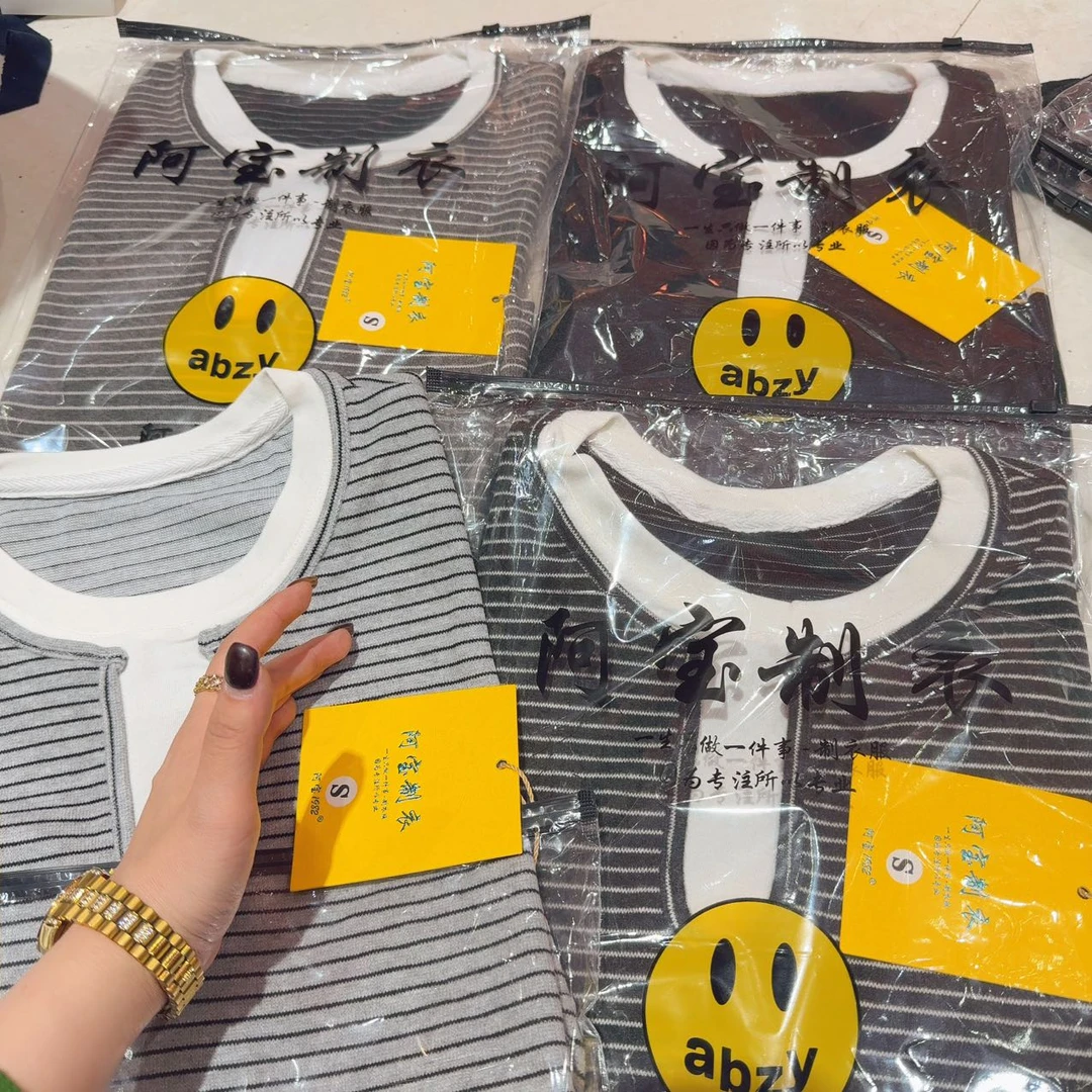 1005韩系假两件拼接慵懒 Cior Studio韩系显瘦拼接假两件上衣