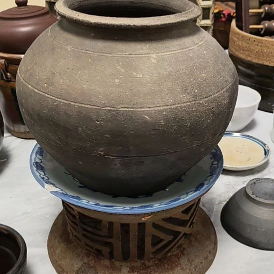 二***哥一个灰陶关系圆形的