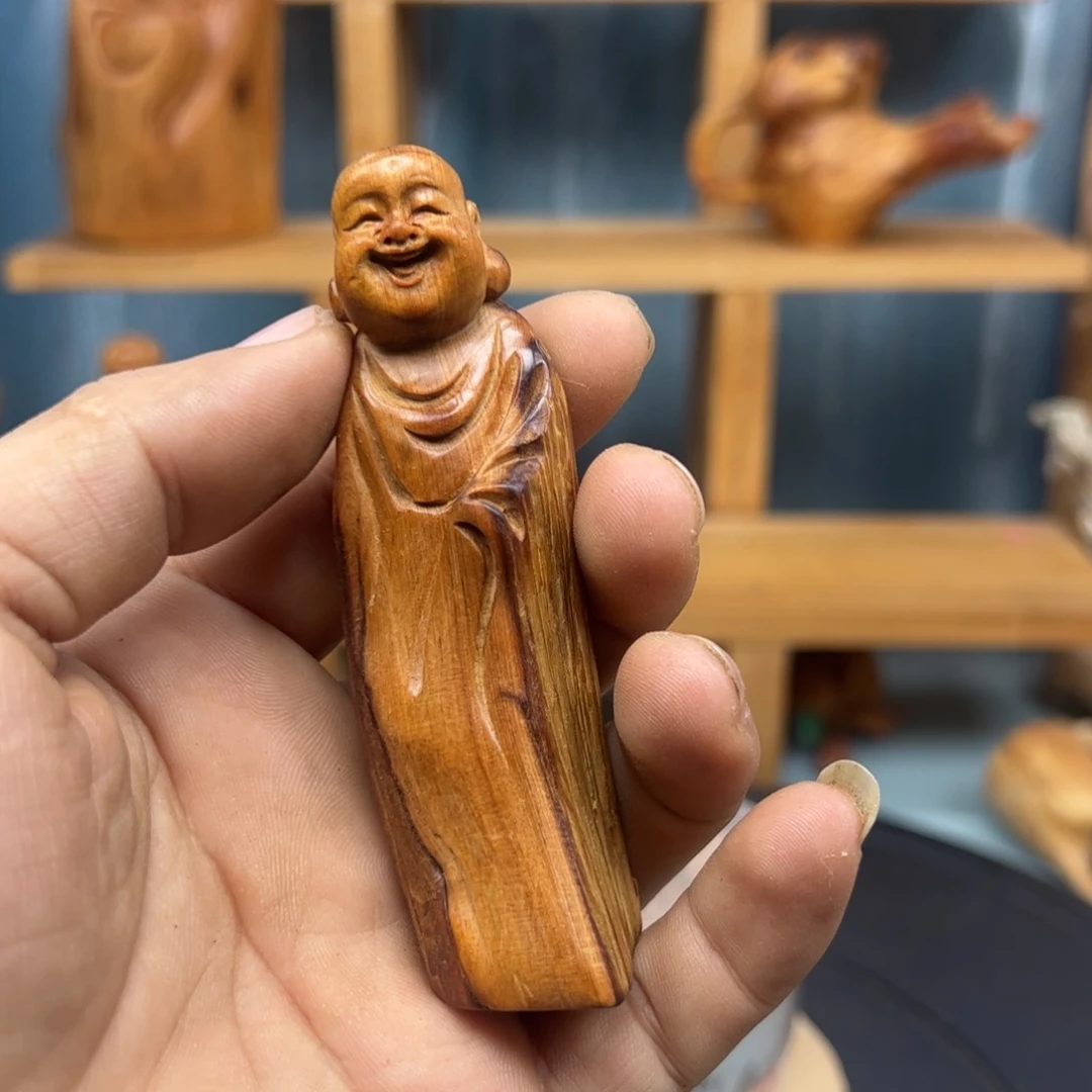 木激**进崖柏木摆件手把件