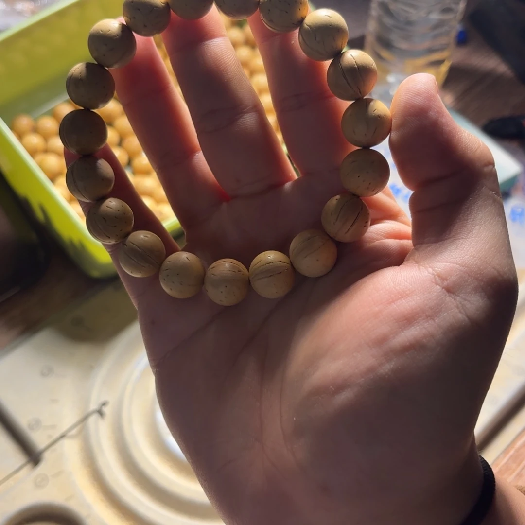 桃核吊坠盘锦奶油皮圆珠头货