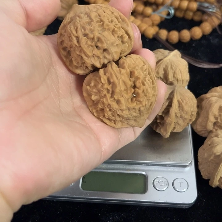 文玩核桃把件42左右夹板官帽微微瑕编号059