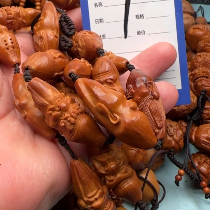 橄榄核手串通****厅橄榄核雕工艺手串