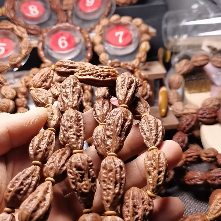 可***雅吊坠文玩核桃东北楸异形籽30