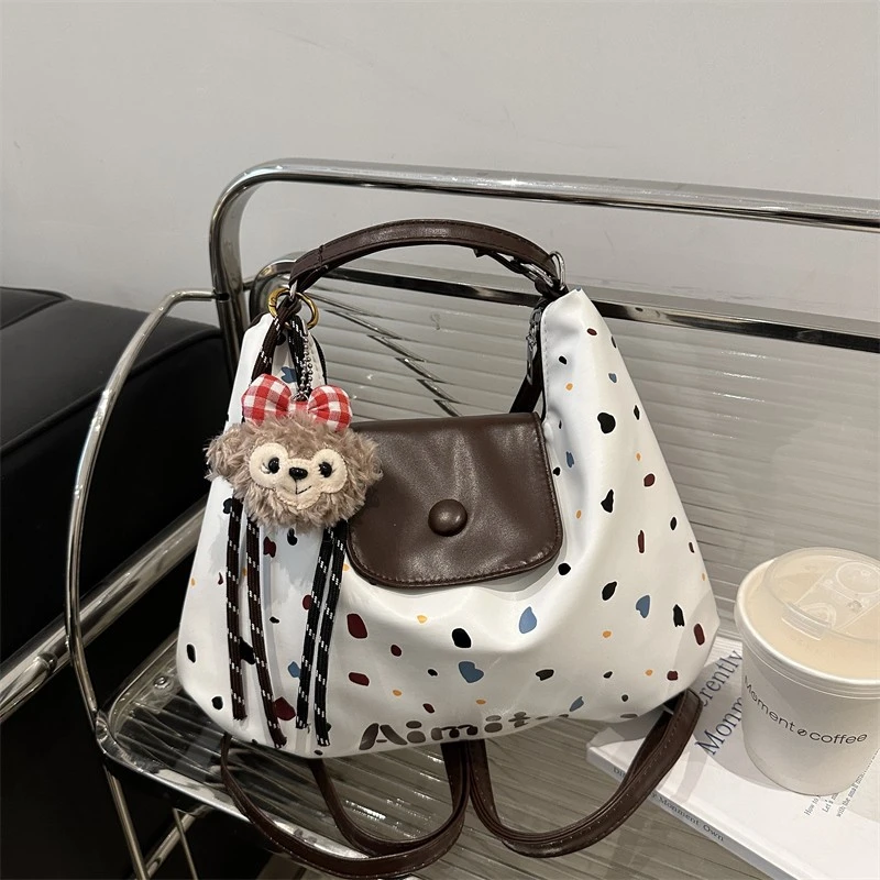 卡通可爱女包2025新款托特包大容量单肩包通勤波点时尚百搭包包PU