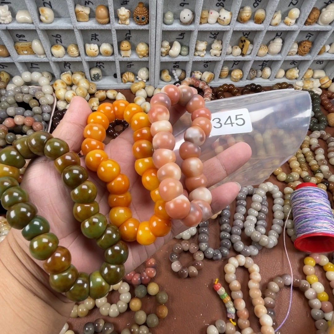 酥***羽吊坠菩提根/象牙果