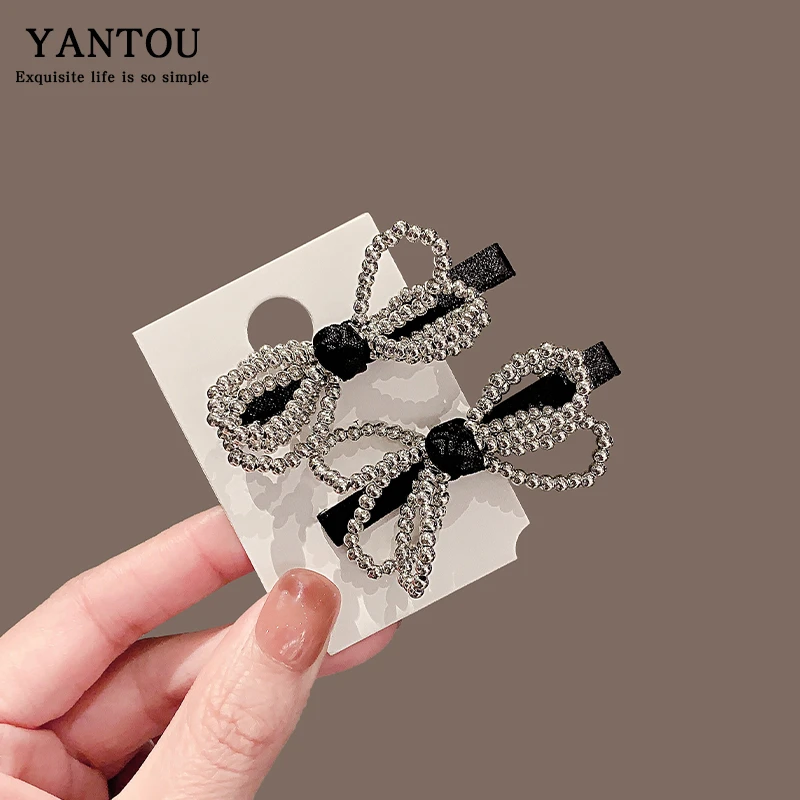 韩国优雅珍珠蝴蝶结发夹女生气质侧边刘海发卡复古高级感夹子头饰